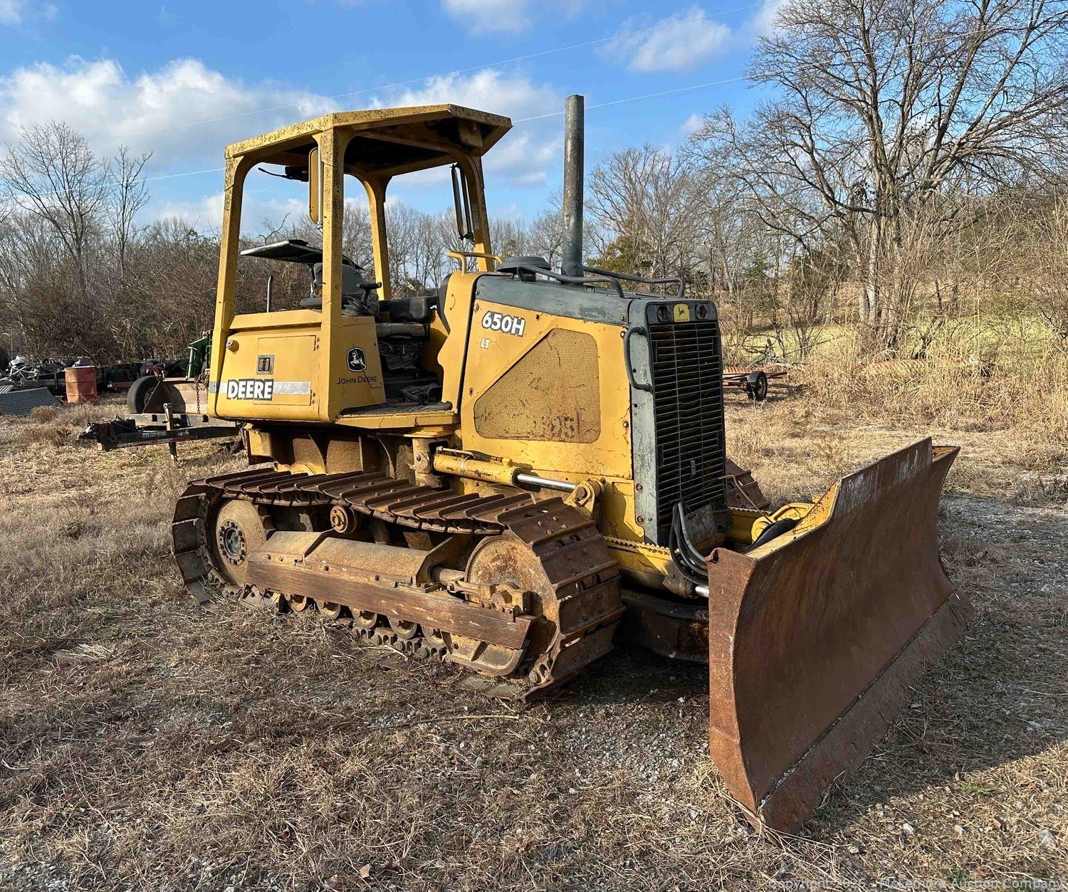 John Deere 650H dozer sold in a heavy equipment estate liquidation