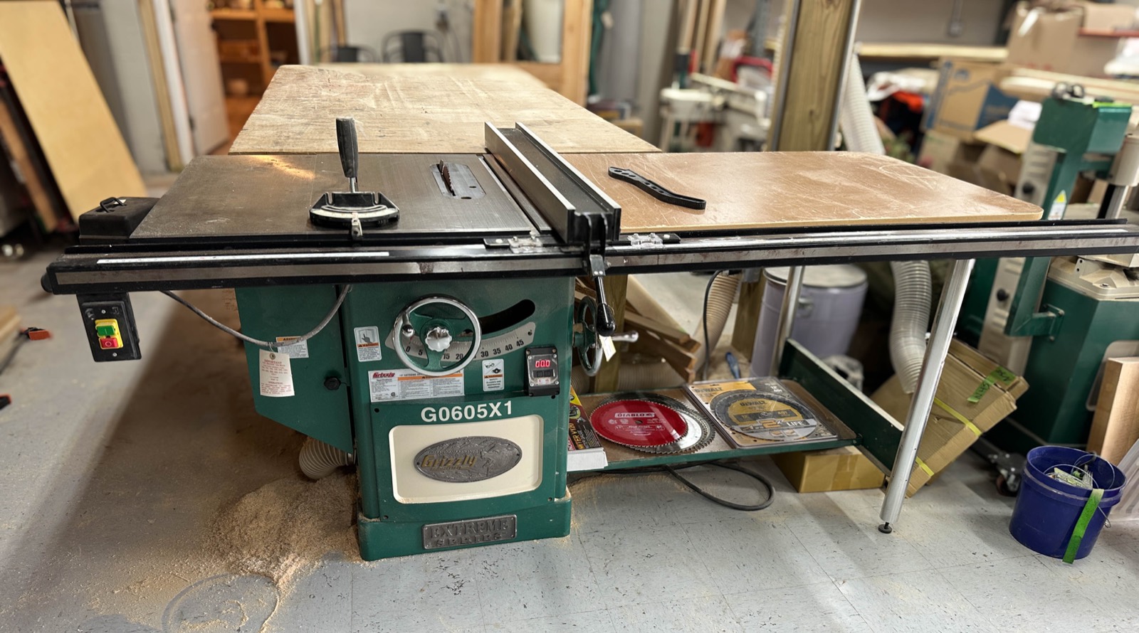 Grizzly table saw on the floor of the Griffith Woodworking shop auction